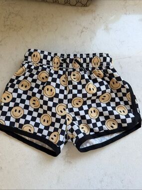 Black & White Checkerboard Shorts with yellow Smiley Faces